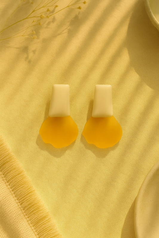 Modern mustard yellow and cream resin earrings with abstract petal shape – bold anti-tarnish statement jewelry for women.
