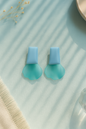 Teal and pastel blue resin anti-tarnish earrings with abstract petal design – bold modern statement jewelry for women.