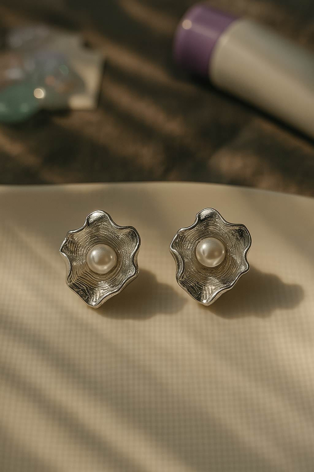 Textured silver anti-tarnish earrings with flower design and freshwater pearl center – perfect for occasion and festive wear