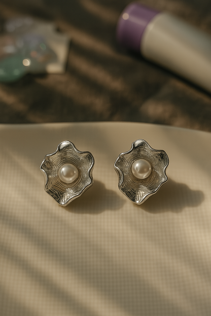 Textured silver anti-tarnish earrings with flower design and freshwater pearl center – perfect for occasion and festive wear