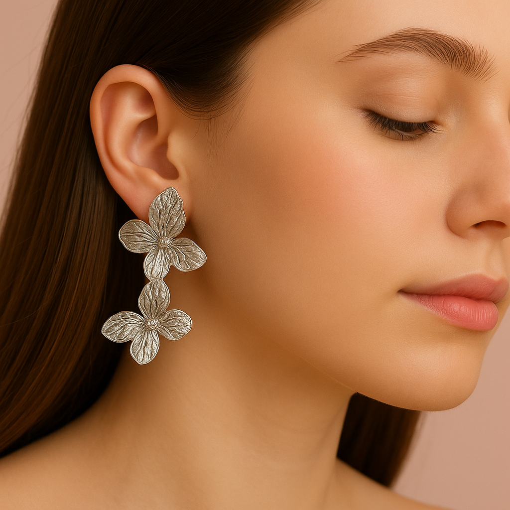 Textured silver butterfly stud earrings, intricately detailed animal motif jewelry for women