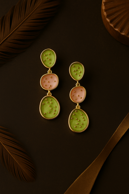 Traditional Meenakari enamel earrings with soft hues – elegant gold-framed dangle earrings for women