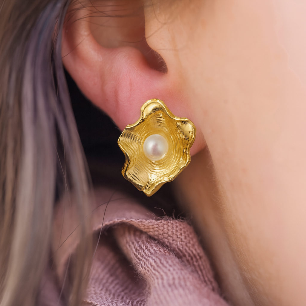 anti-tarnish earrings featuring sculpted wave petals and central pearl – timeless luxury studs for women