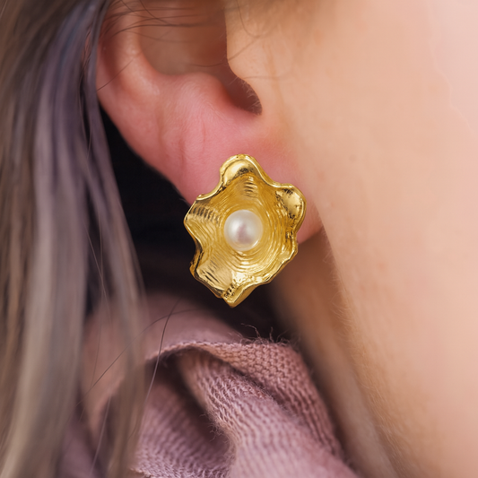 anti-tarnish earrings featuring sculpted wave petals and central pearl – timeless luxury studs for women